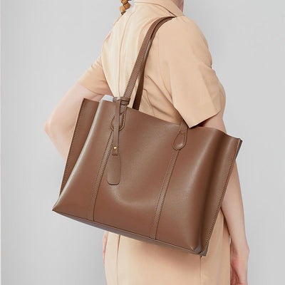 Preppy leather shoulder bag women, stylish cowhide crossbody bag, light luxury commuter Tote bag