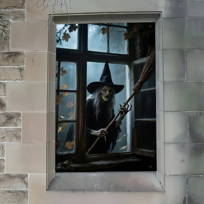 The Halloween party of the haunted house witch in the window, the witch wearing a hat and a broom emerging from the foggy window