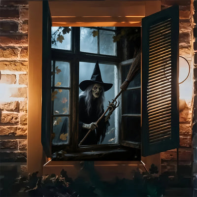 The Halloween party of the haunted house witch in the window, the witch wearing a hat and a broom emerging from the foggy window