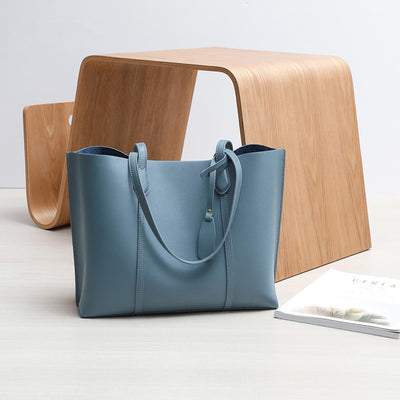 Preppy leather shoulder bag women, stylish cowhide crossbody bag, light luxury commuter Tote bag